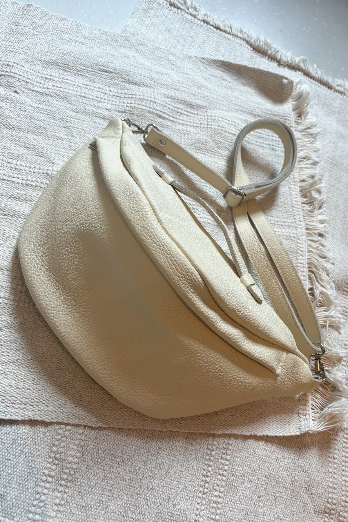 Oversize leather belt bag - butter color