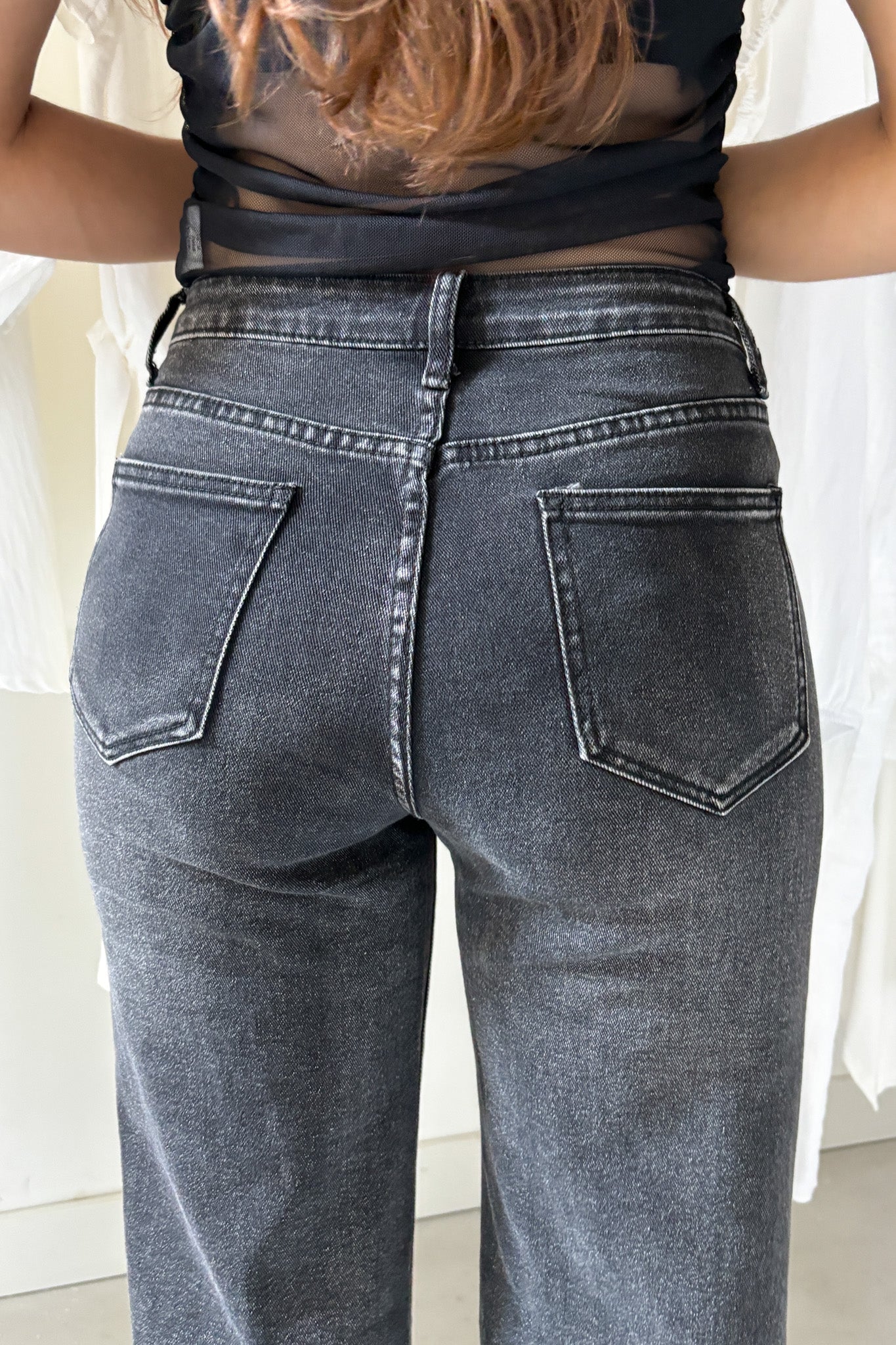 Koptatott, fekete trapéznadrág