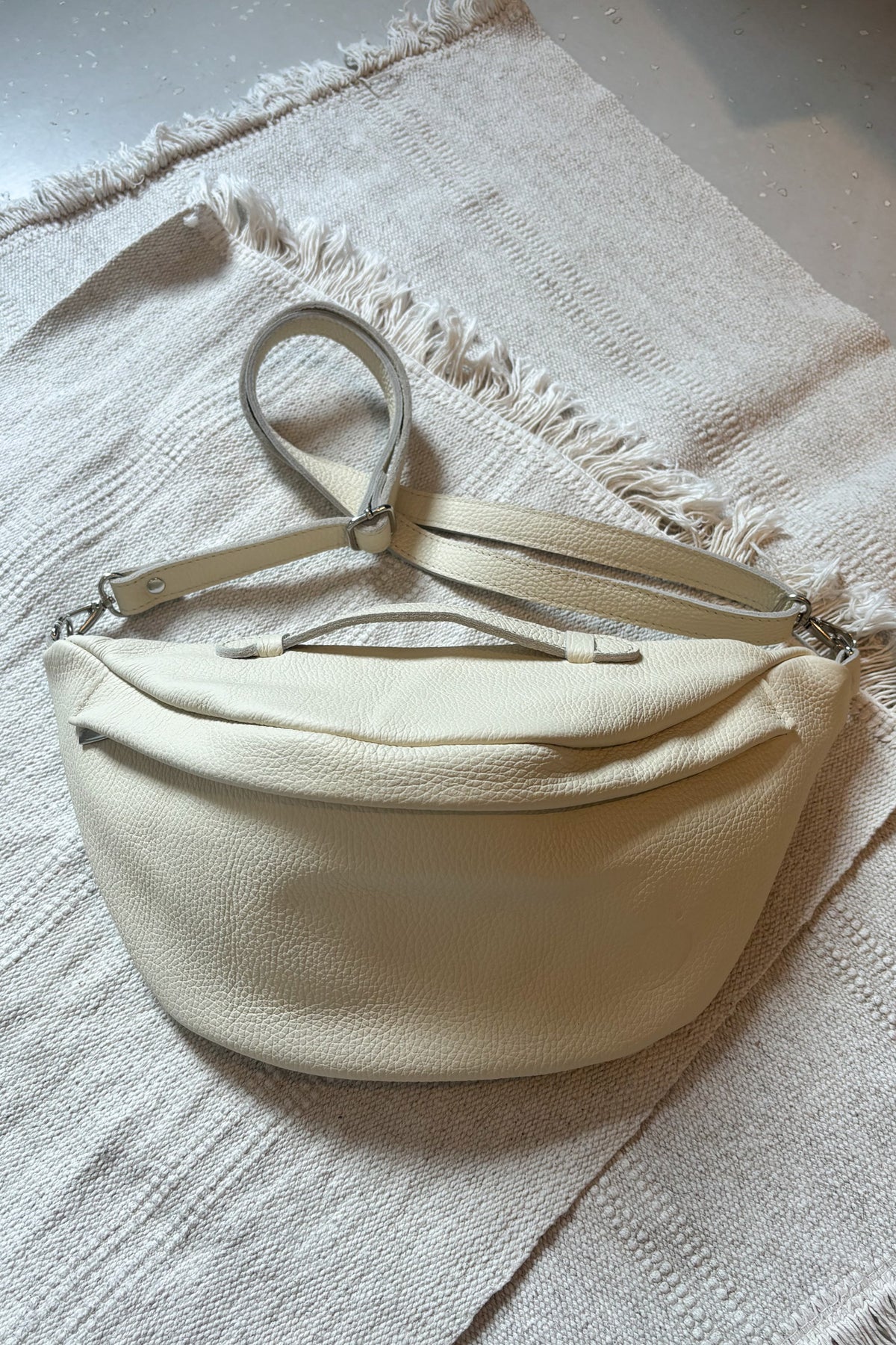 Oversize leather belt bag - butter color