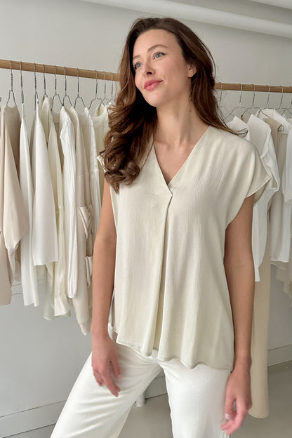 Hajtásos rövidujjú blúz