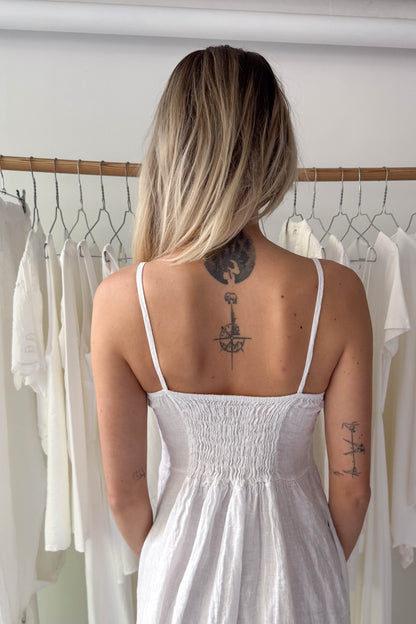 White linen dress with straps
