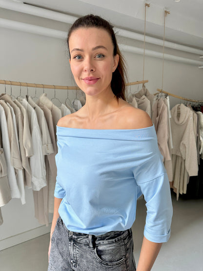 Vállra lehúzós felső