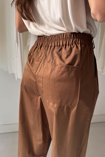 Mazsolabarna pamutkarton nadrág rózsaszín kötővel