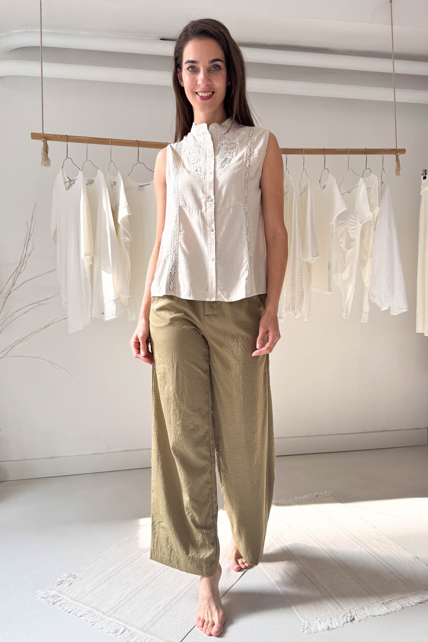 Sleeveless blouse with embroidery and lace insert