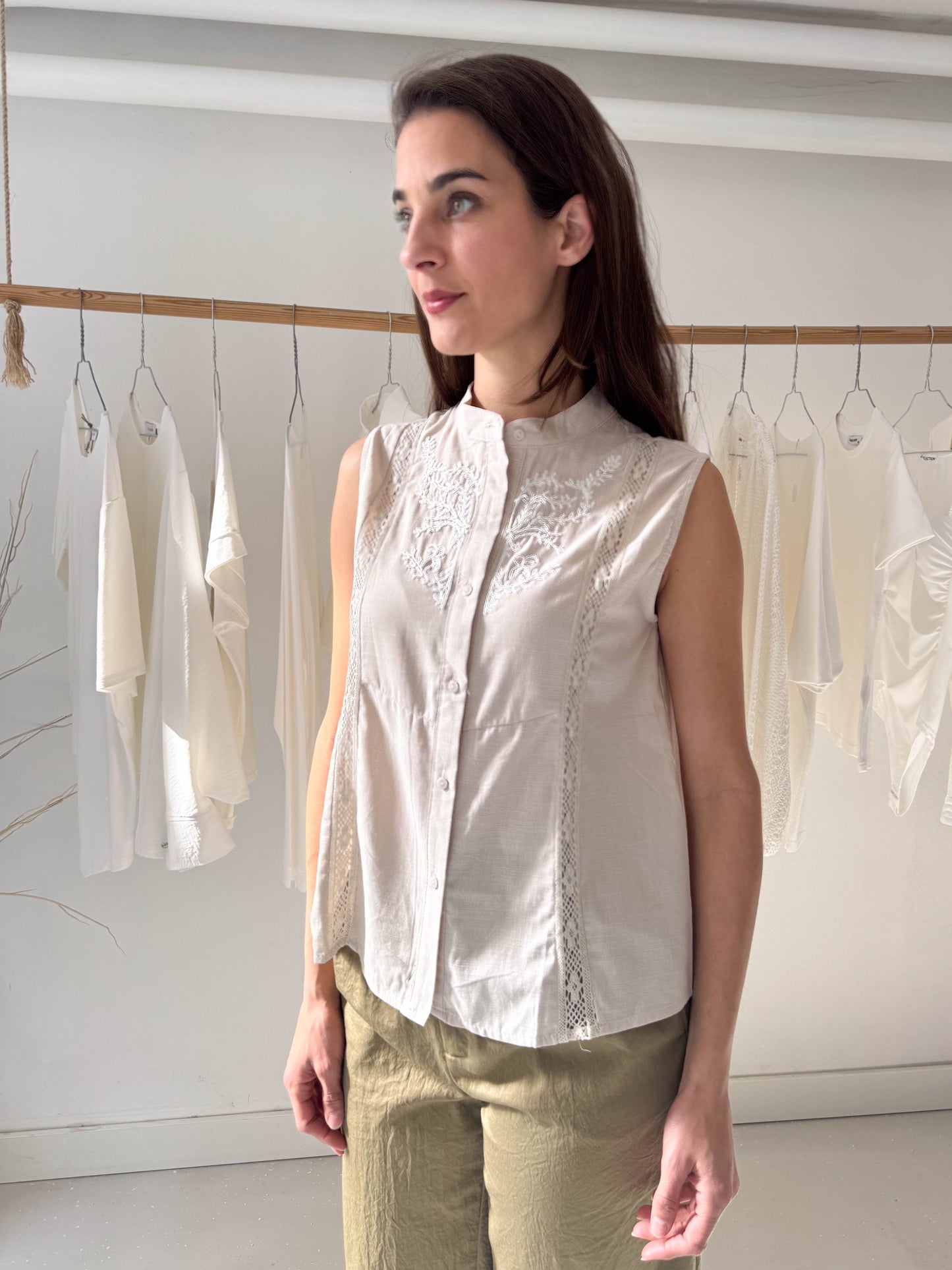 Sleeveless blouse with embroidery and lace insert